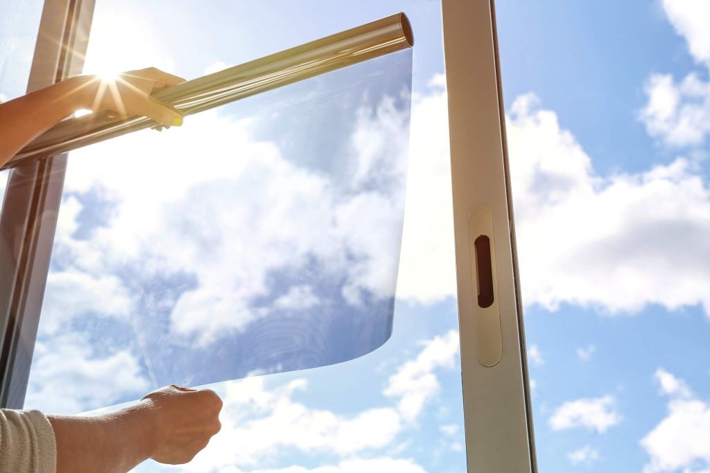 Side by side comparison of solar screens and window tinting for Scottsdale AZ homes by Spotless Window Squad
