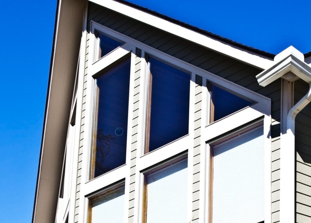 Visual comparison of window tinting and solar screens provided by Spotless Window Squad in Scottsdale AZ
